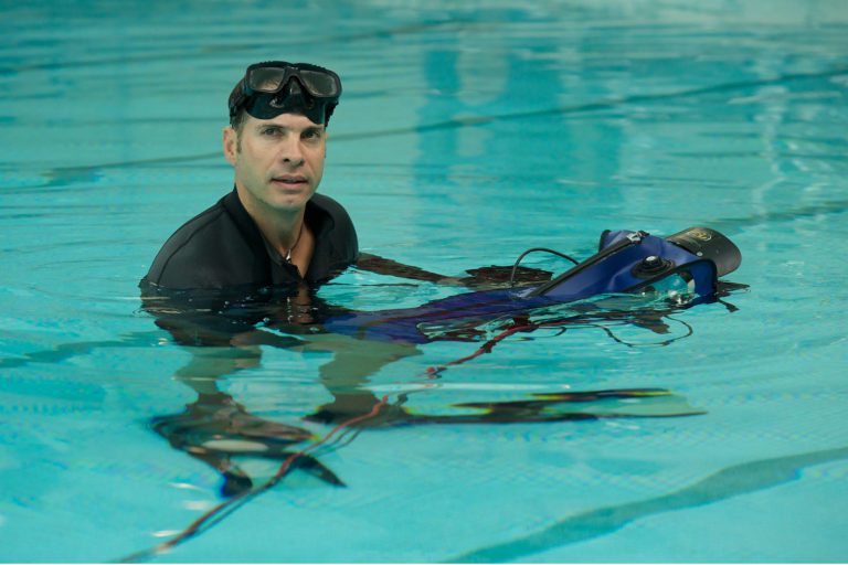 Anthony Shoots Underwater With A Nurse